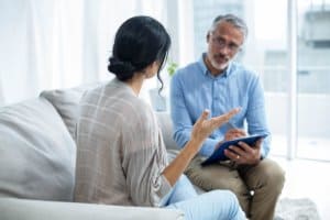 Therapist guiding a patient through a dialectical behavior therapy program