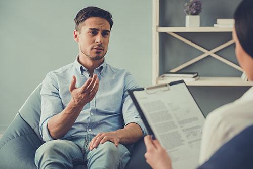 Man speaks to his therapist and asks what is psychodrama therapy