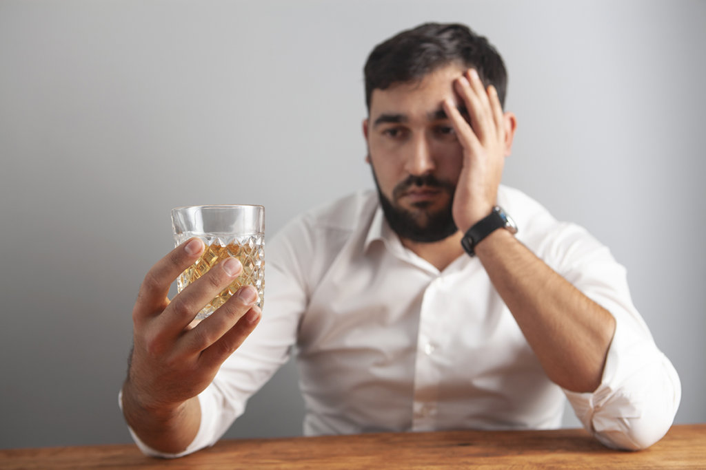 Man wonders to himself Am I an Alcoholic?
