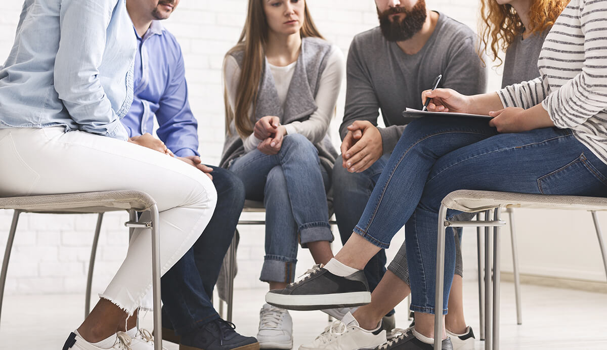 Group therapy session discusses the uses and history of meth