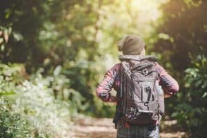 man walking on trail as part of recreational therapy program