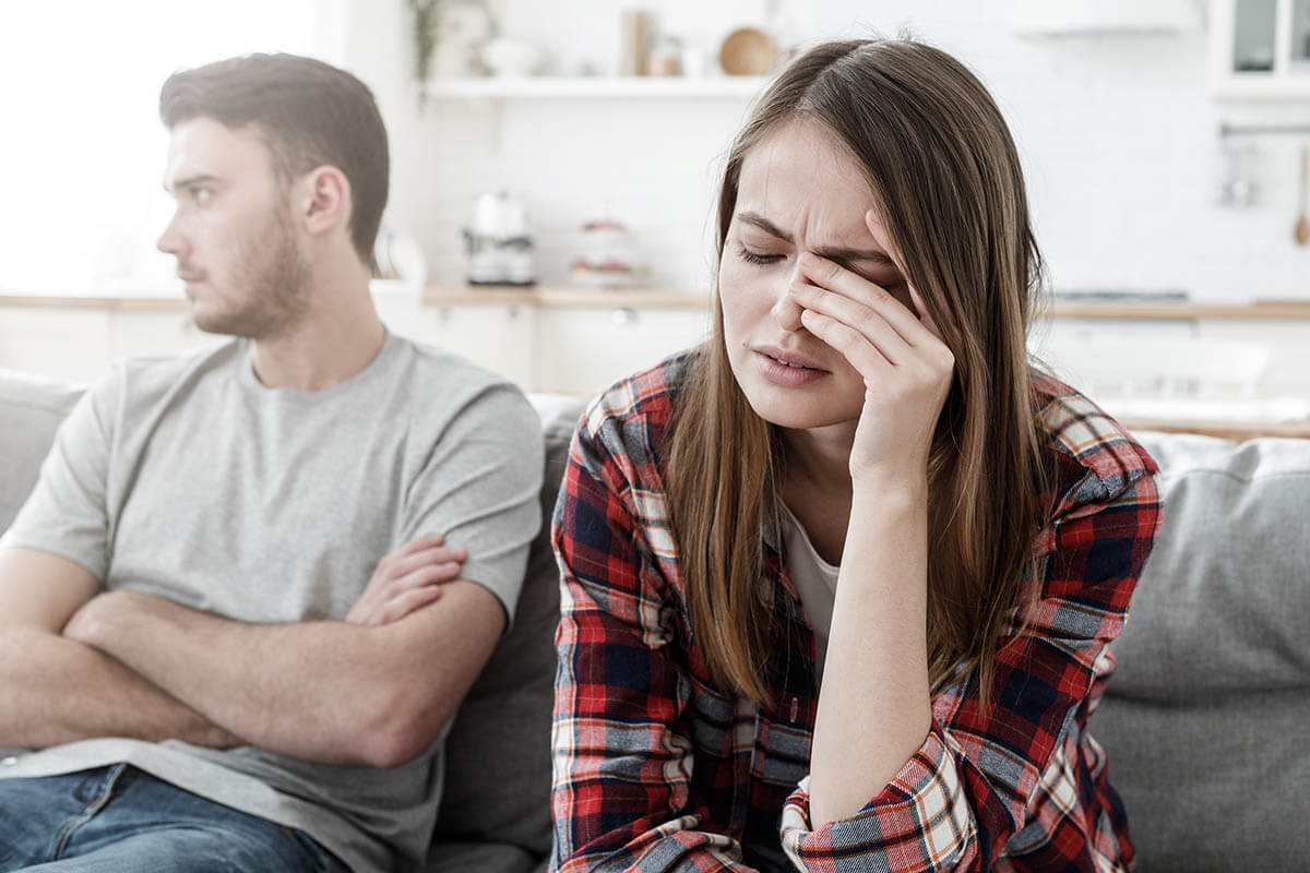 a woman being stressed out while her family member shows signs of codependency