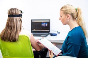 therapist and client during neurofeedback addiction treatment